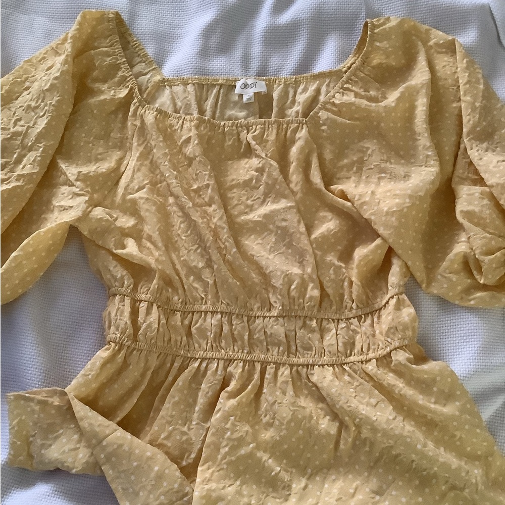 Yellow Swiss dot puff sleeve shirt